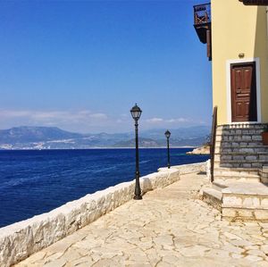 Scenic view of sea against clear blue sky