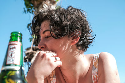 Close-up portrait of women drink bottle