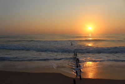 Scenic view of sea against sky during sunset