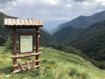 Panoramic view of central balkan national park, wooden information board with a map