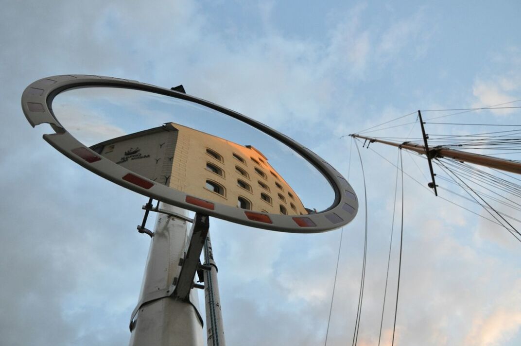 low angle view, sky, cloud - sky, cloud, cloudy, pole, street light, outdoors, no people, day, blue, lighting equipment, electricity, sunlight, built structure, technology, part of, metal, power line, fuel and power generation