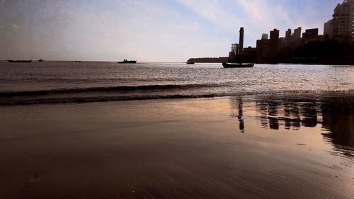 Scenic view of sea at sunset