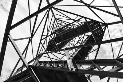 Low angle view of metallic structure against sky