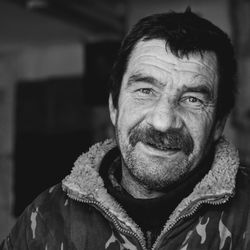 Portrait of smiling man at home