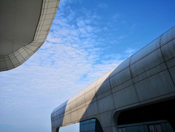 Low angle view of modern building against sky