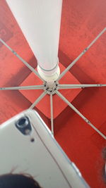 High angle view of red umbrella