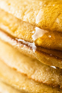 Honey closeup on pancakes