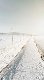 Scenic view of road  in the mountains winter