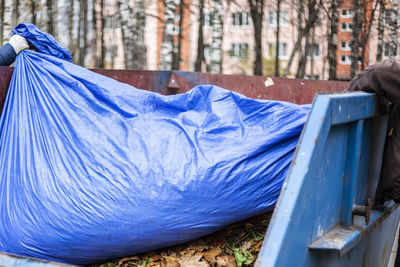 Leaves collected from the site. harvesting dead plants. taking out the trash. utility services. 