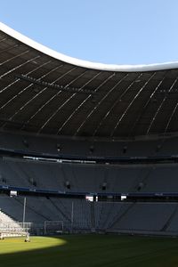 Low angle view of soccer ball against blue sky