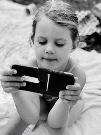 Close-up of cute girl holding ice cream