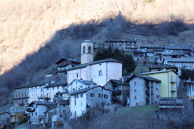 High angle view of houses and buildings during winter