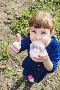 Cropped hand holding globe