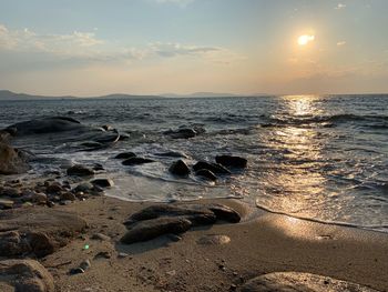 Scenic view of sea against sky during sunset