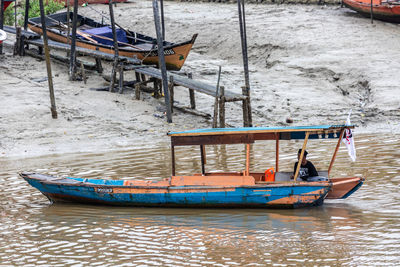 Fishing boat moored at shore