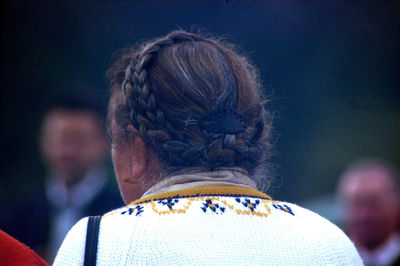 Rear view portrait of woman outdoors