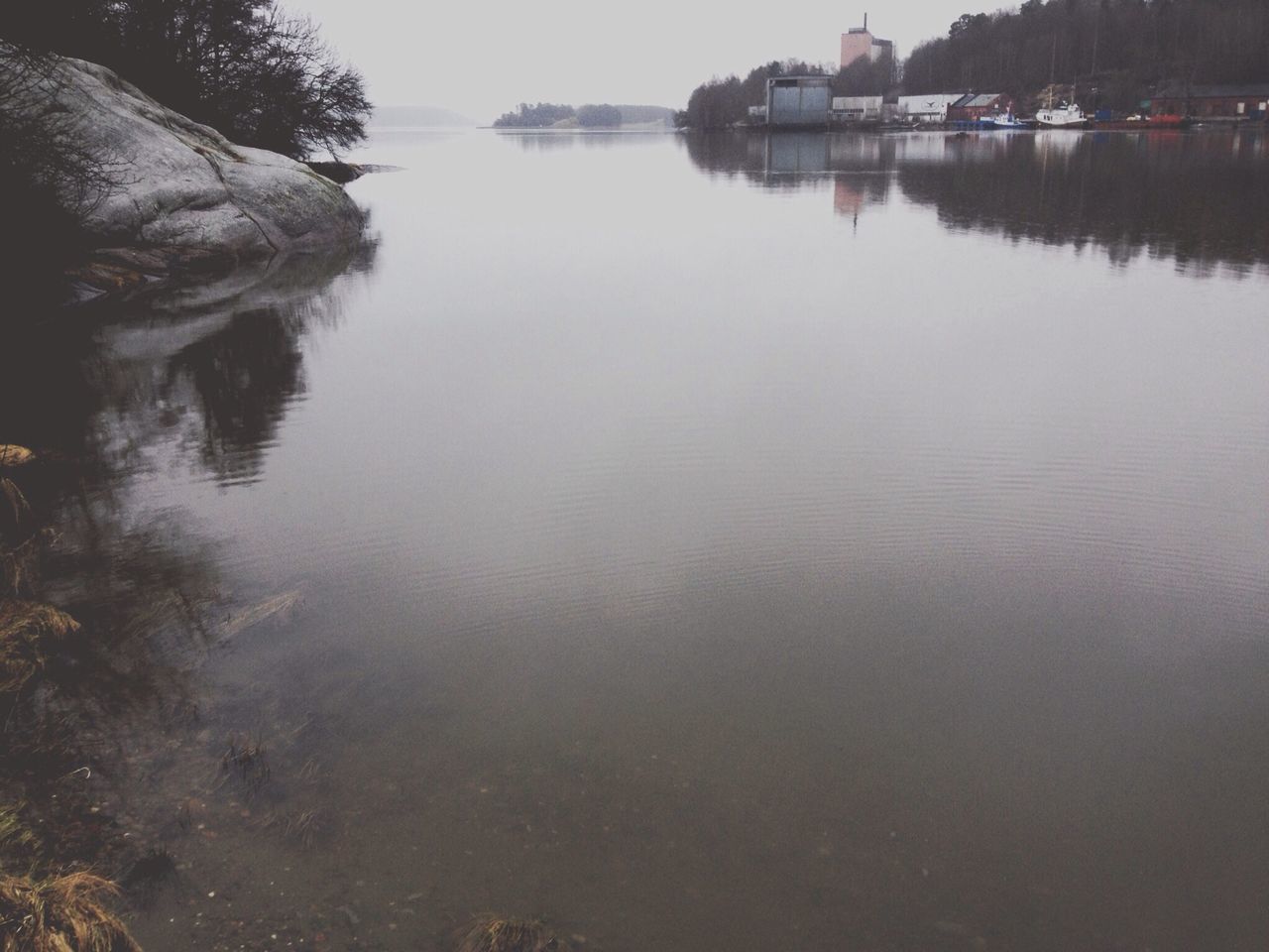 water, reflection, lake, tranquility, tranquil scene, tree, waterfront, scenics, nature, beauty in nature, river, rippled, calm, standing water, lakeshore, idyllic, sky, outdoors, day, no people