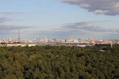 High angle view of buildings in city against sky