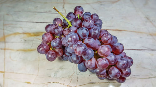 Close-up of grapes growing on table