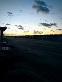 Scenic view of beach against sky during sunset