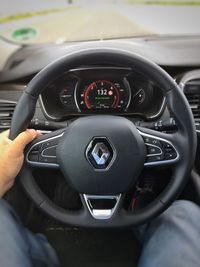 Close-up of man driving car