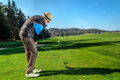 Man standing on golf course