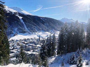 Scenic view of snow covered mountains against sky