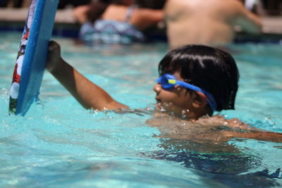 People swimming in pool