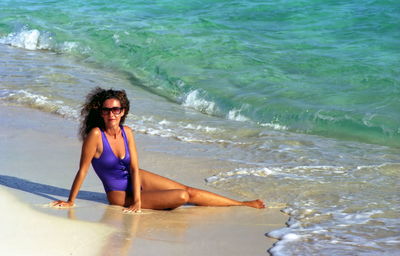 Full length of woman on beach