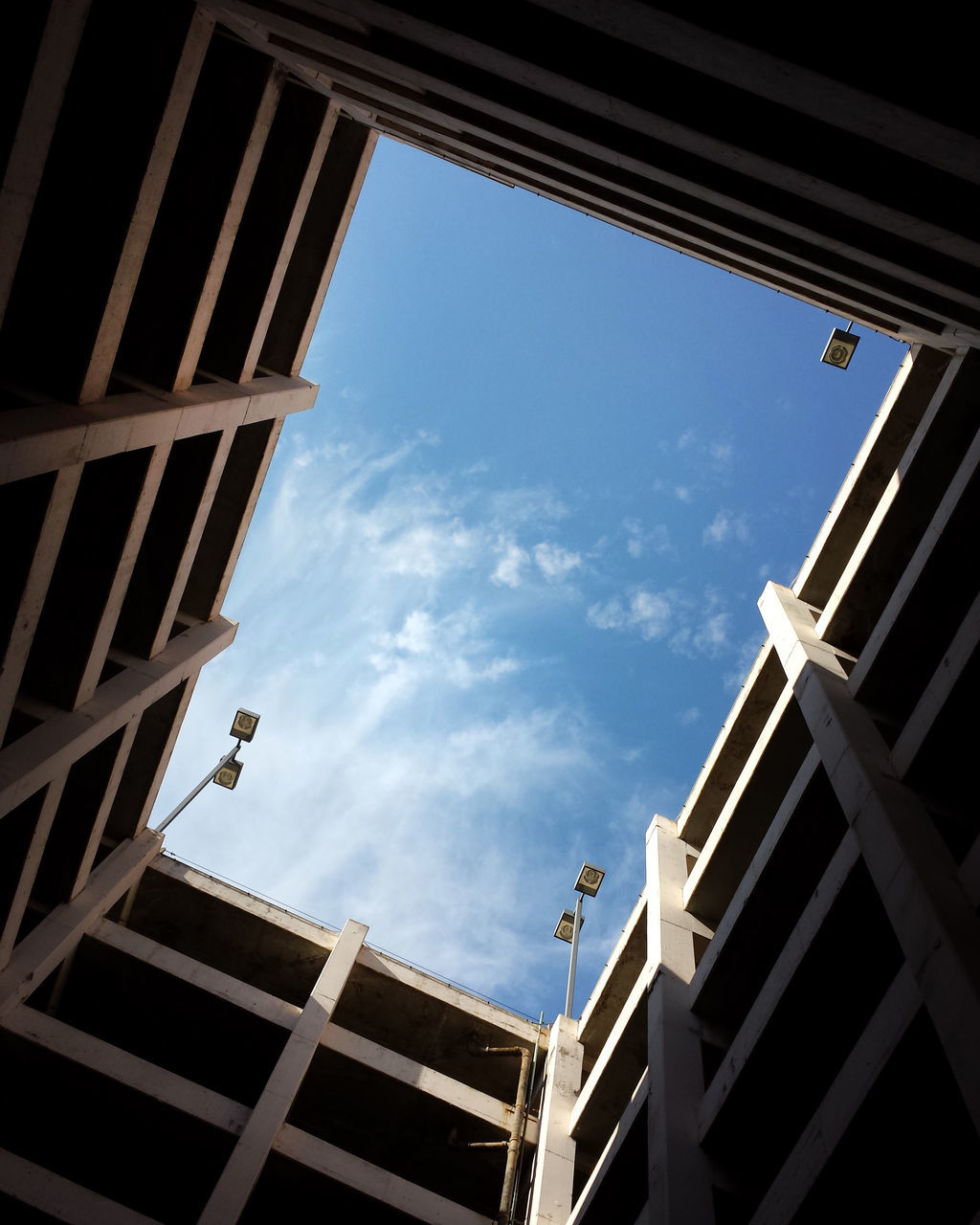 LOW ANGLE VIEW OF RESIDENTIAL BUILDINGS AGAINST SKY