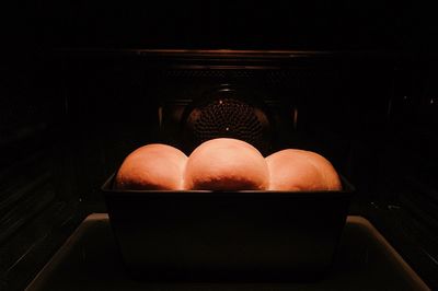 Close-up of candles in bowl