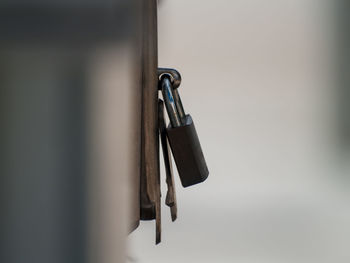 Close-up of padlock on door