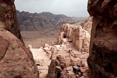 Panoramic view of rocks and mountains against sky