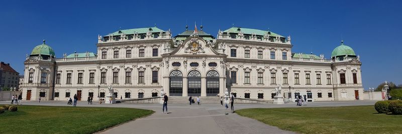 Facade of historical building against clear blue sky