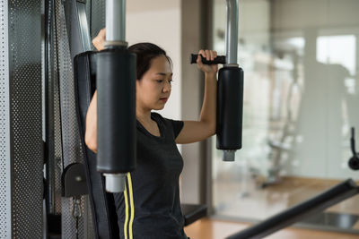 Woman exercising in gym