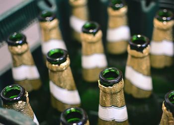 Close-up of wine bottles on table