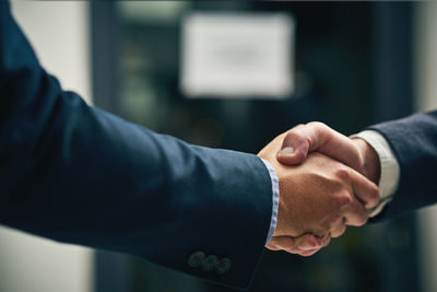 Cropped image of business colleagues shaking hands