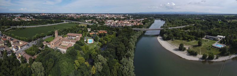 High angle view of river amidst buildings in city