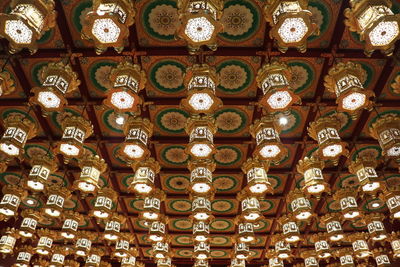 Low angle view of illuminated chandelier