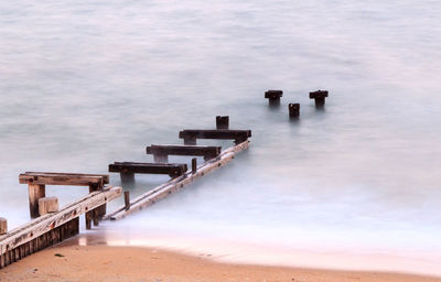 Empty jetty leading to sea