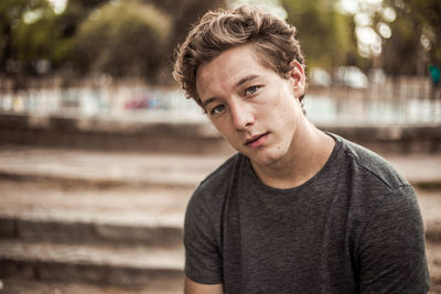 Close-up portrait of thoughtful handsome young man 