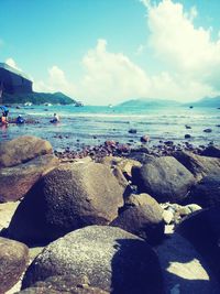 Scenic view of sea against cloudy sky