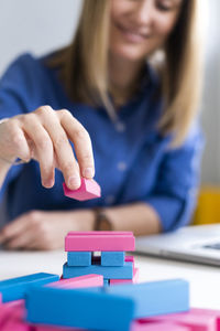 Close-up of woman on table