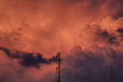 Low angle view of dramatic sky at sunset