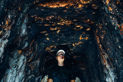 Man in gold mine cave