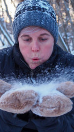 Portrait of man in snow