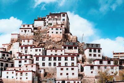 Low angle view of houses against sky