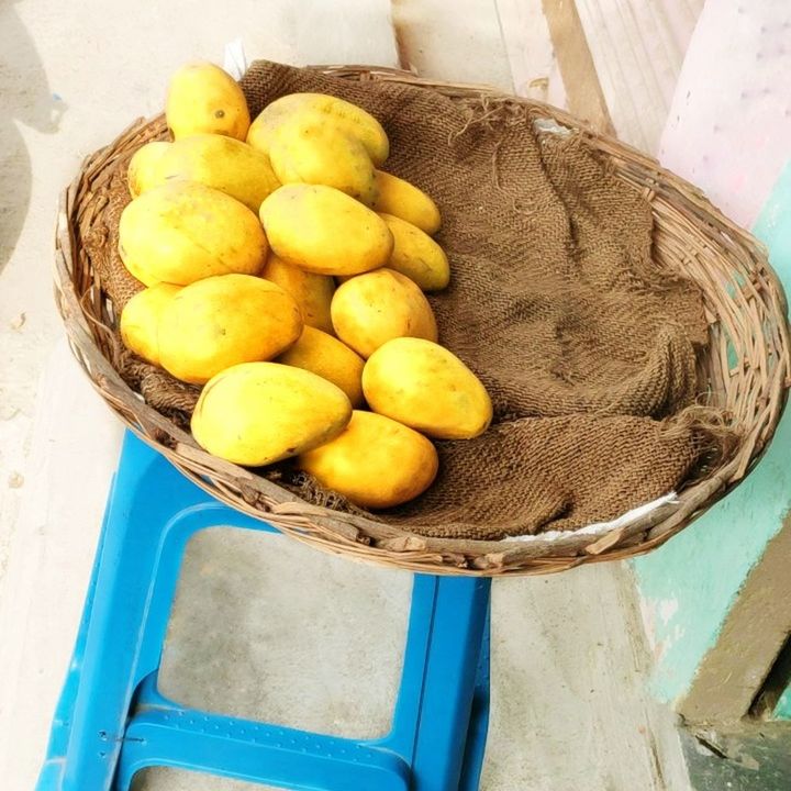 food, food and drink, container, healthy eating, freshness, basket, produce, wellbeing, fruit, high angle view, plant, no people, still life, yellow, day, retail, market, organic, abundance, for sale, wood, outdoors, box