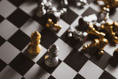 High angle view of chess pieces on floor