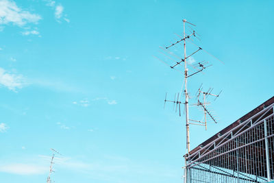 Low angle view of building against blue sky